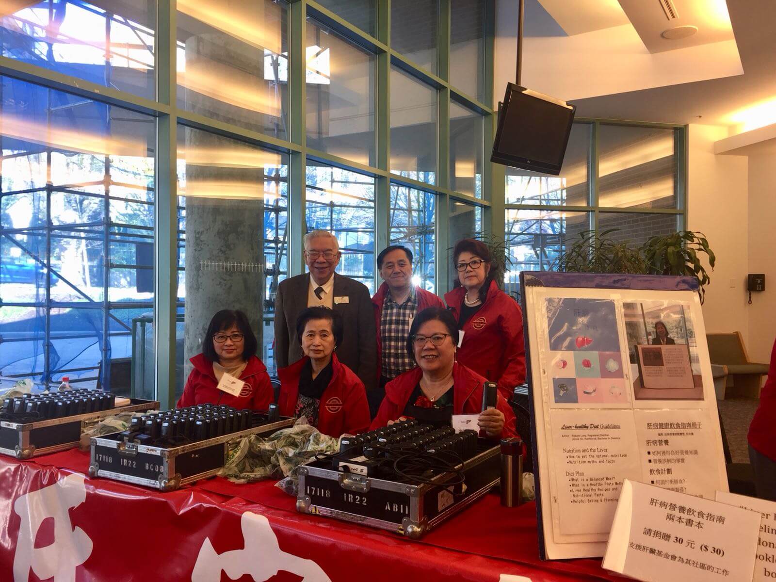 Members of Ho's Association at a forum table