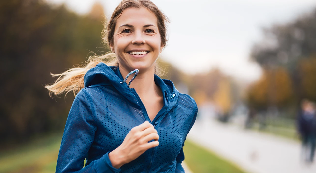 Smiling woman on a run